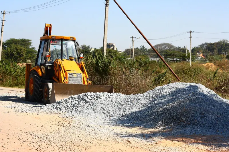 yellow-backhoe-loader-road-construction-22945297